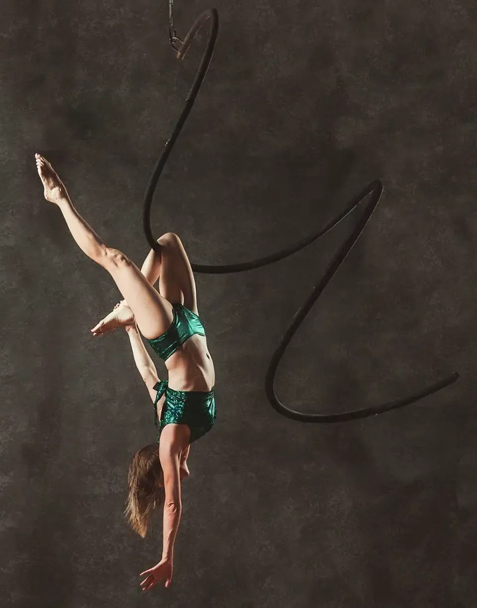 Aerial Spiral Pole performance by The Aerial Illusions Company